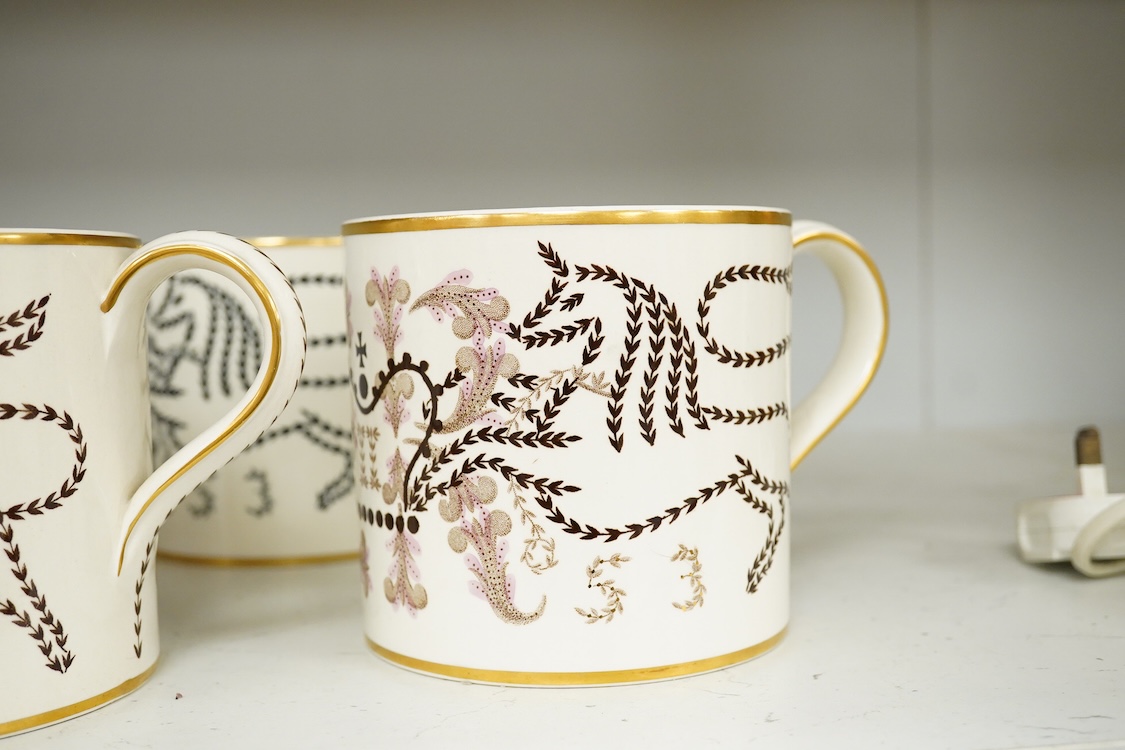 Six Wedgwood Commemorative mugs comprising Eric Ravilious 1953 Coronation of Queen Elizabeth examples and a 1939 Garden Implements example, largest 12cm high (four a.f)